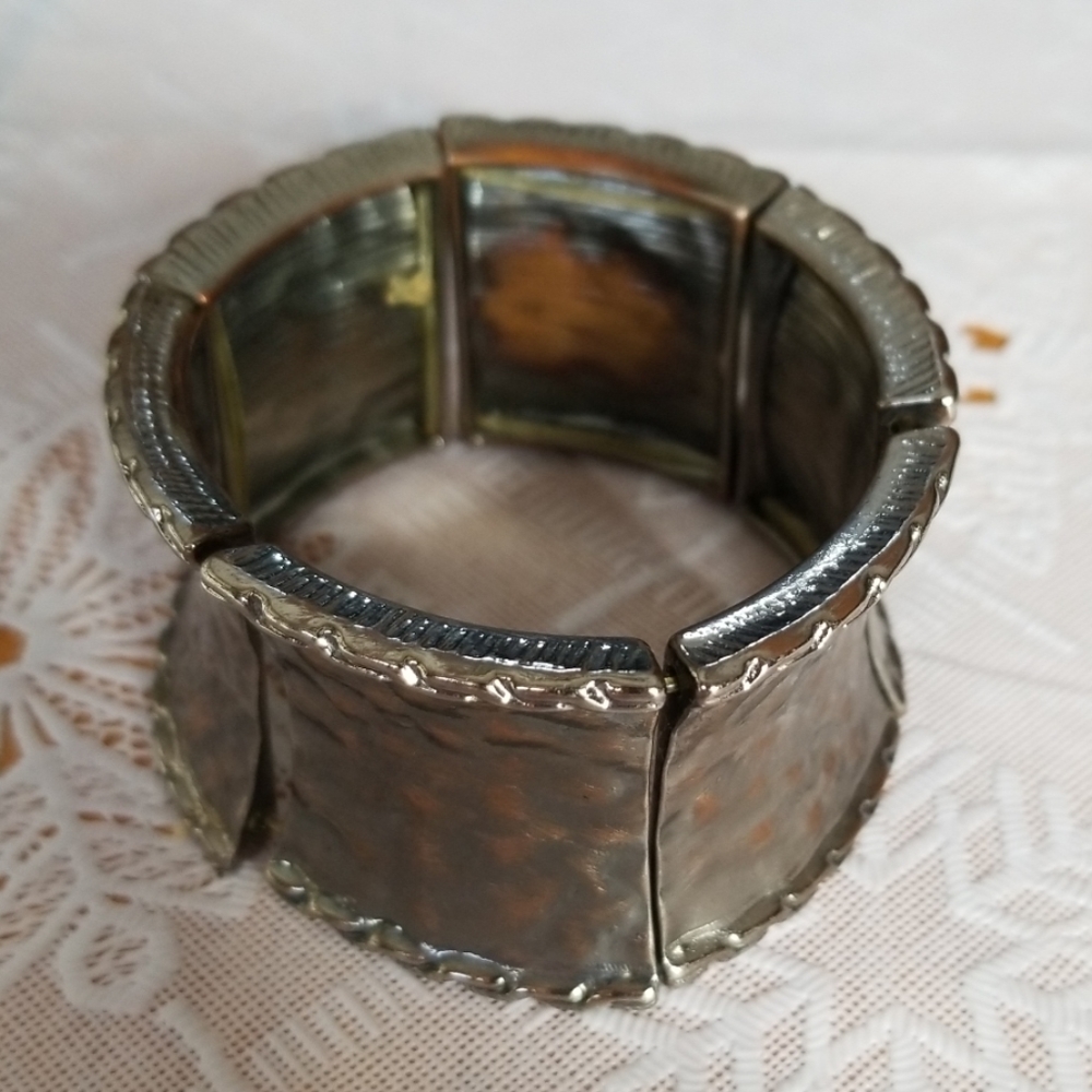 Wide hammered metal bracelet